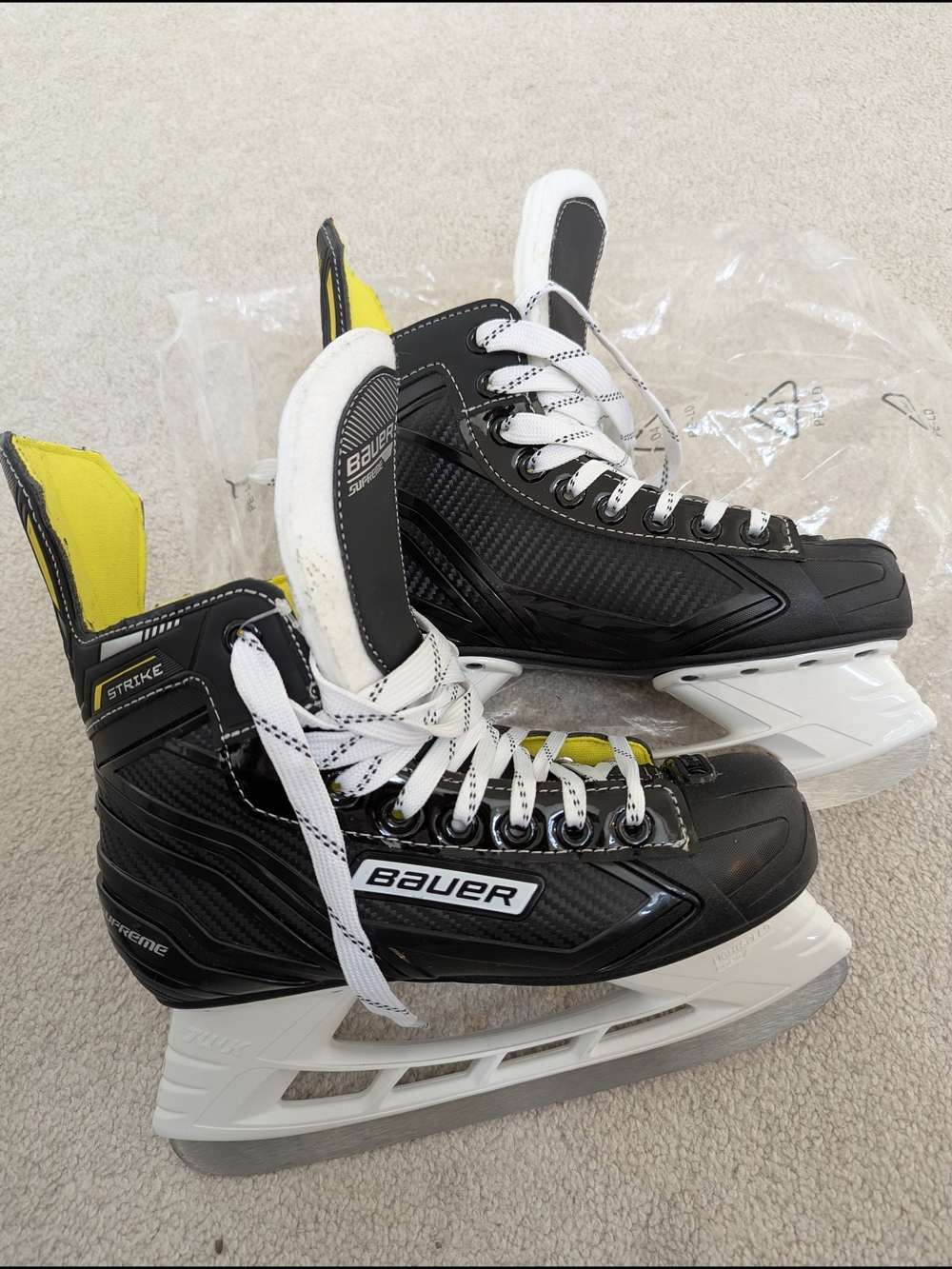 Bauer Black Hockey Skates with Yellow Accents